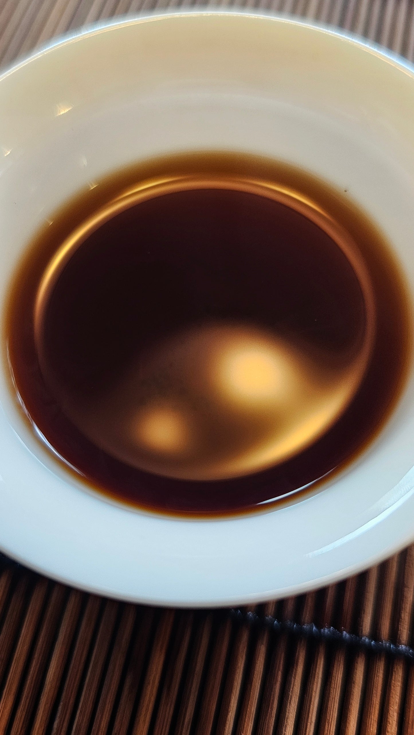 A daily drinker with soul. This 2005 Shu Puerh is clean, complex, and motivating. Notes of dark toffee, clove, and grounding camphor.