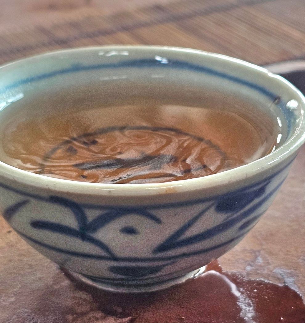 This 2005 Yiwu Sheng Puerh is made from ancient tree material and aged in Malaysia. Smooth, clean, and layered with honeyed depth and long chi.