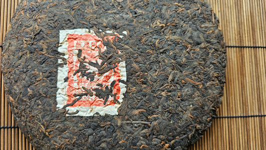 Mahogany | 2012 Tong Xing Hao Shu Puerh aged in clay urns in Malaysia. Aged depth, nutty camphor notes. Featured in the 2025 Tea Arts Study Sampler.