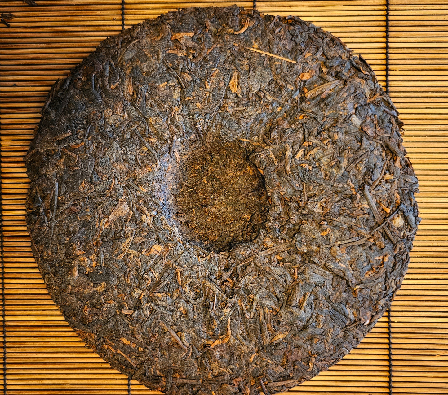 Daily Bread is bold, clean, and energizing. This 2005 Nanqiao Shu Puerh was aged in Malaysia and delivers deep body and clarity in the cup.