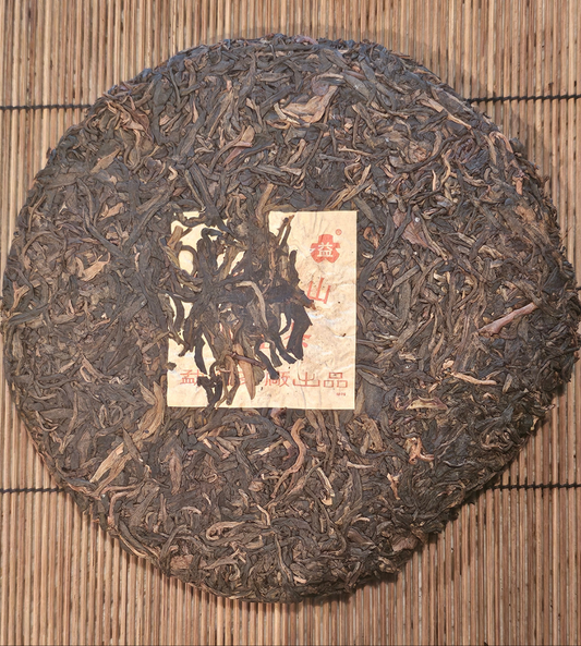 With 20+ years of Malaysian aging, this 2002 Green Tree Sheng from Menghai offers elegant structure, smooth mouthfeel, and grounded chi.