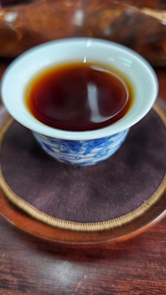 "Powerful Medicine" – 1998 Shu Puerh made from 600–700 year old trees, privately commissioned. Intense ginseng aroma, powerful qi, and deep body warmth.