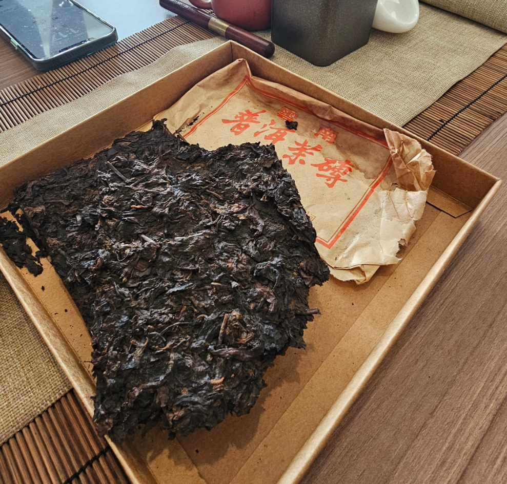 Close-up of "Sweet Forest Medicine" 2000 Yiwu Old Tree Shu Puerh tea cake, aged in Malaysia- Puerh Medicine