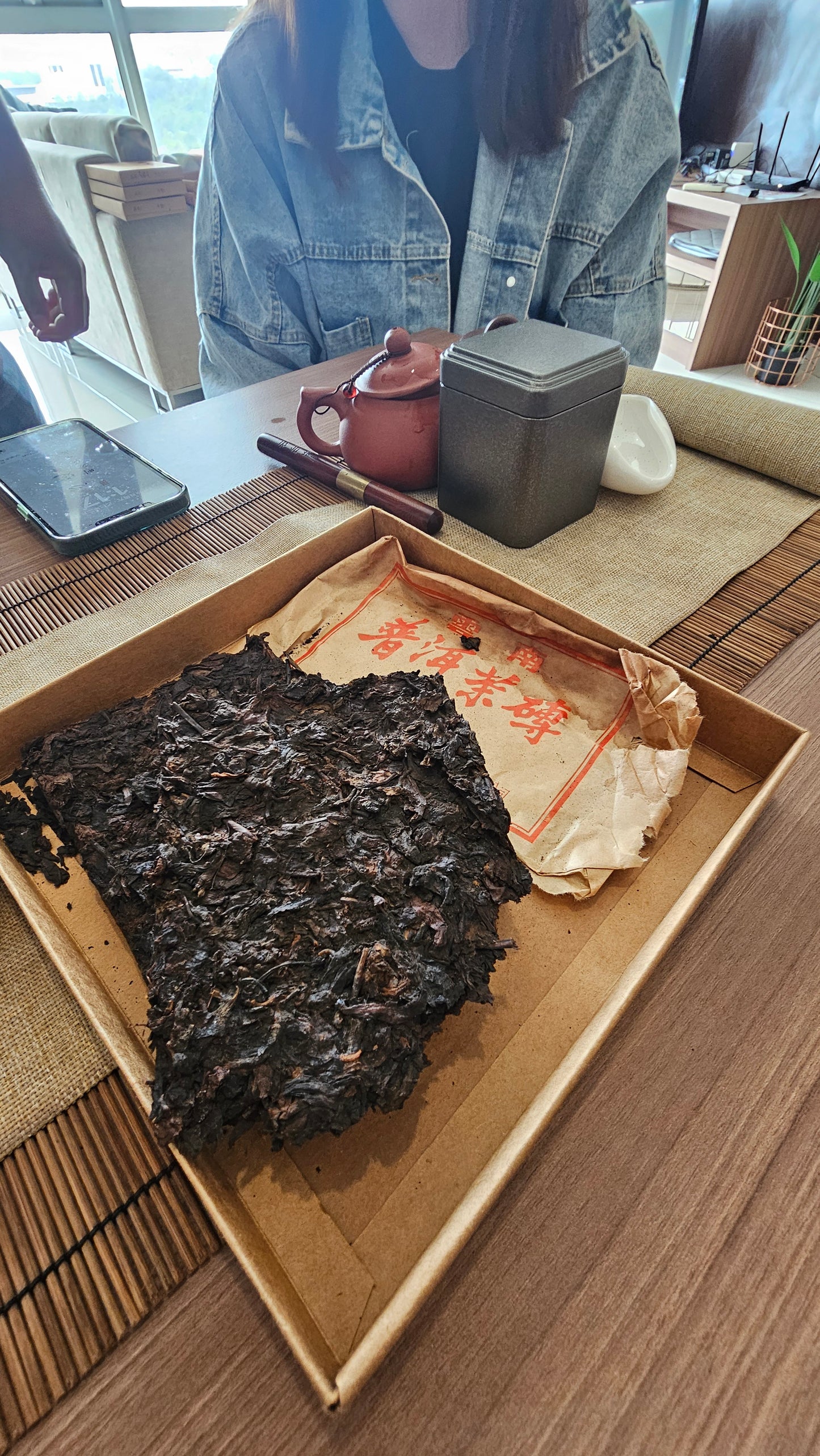 Aged to perfection in Malaysia, this 2000 Yiwu Old Tree Shu Puerh offers rare light fermentation, deep sweetness, and lasting comfort in every cup.