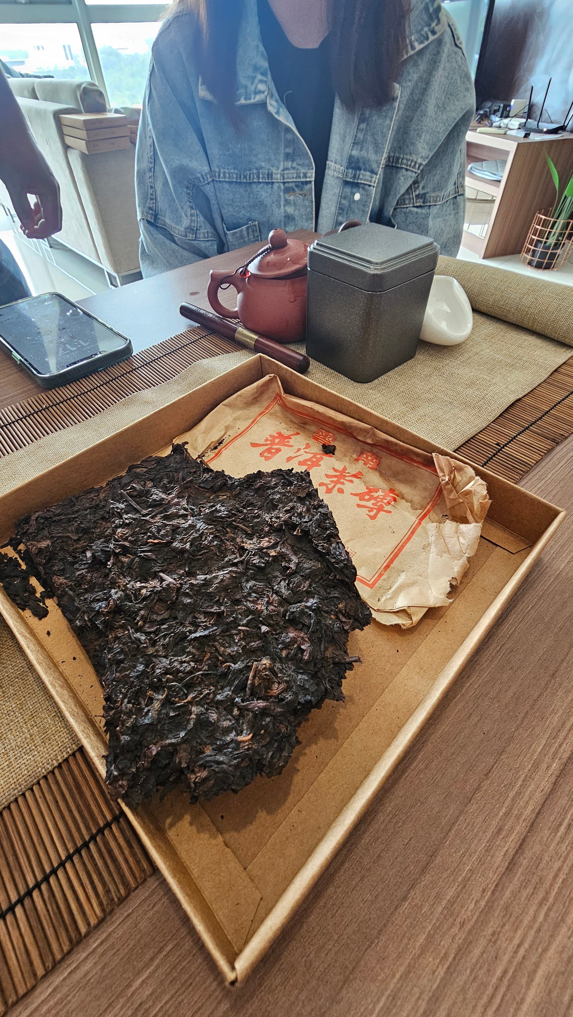 Aged to perfection in Malaysia, this 2000 Yiwu Old Tree Shu Puerh offers rare light fermentation, deep sweetness, and lasting comfort in every cup.