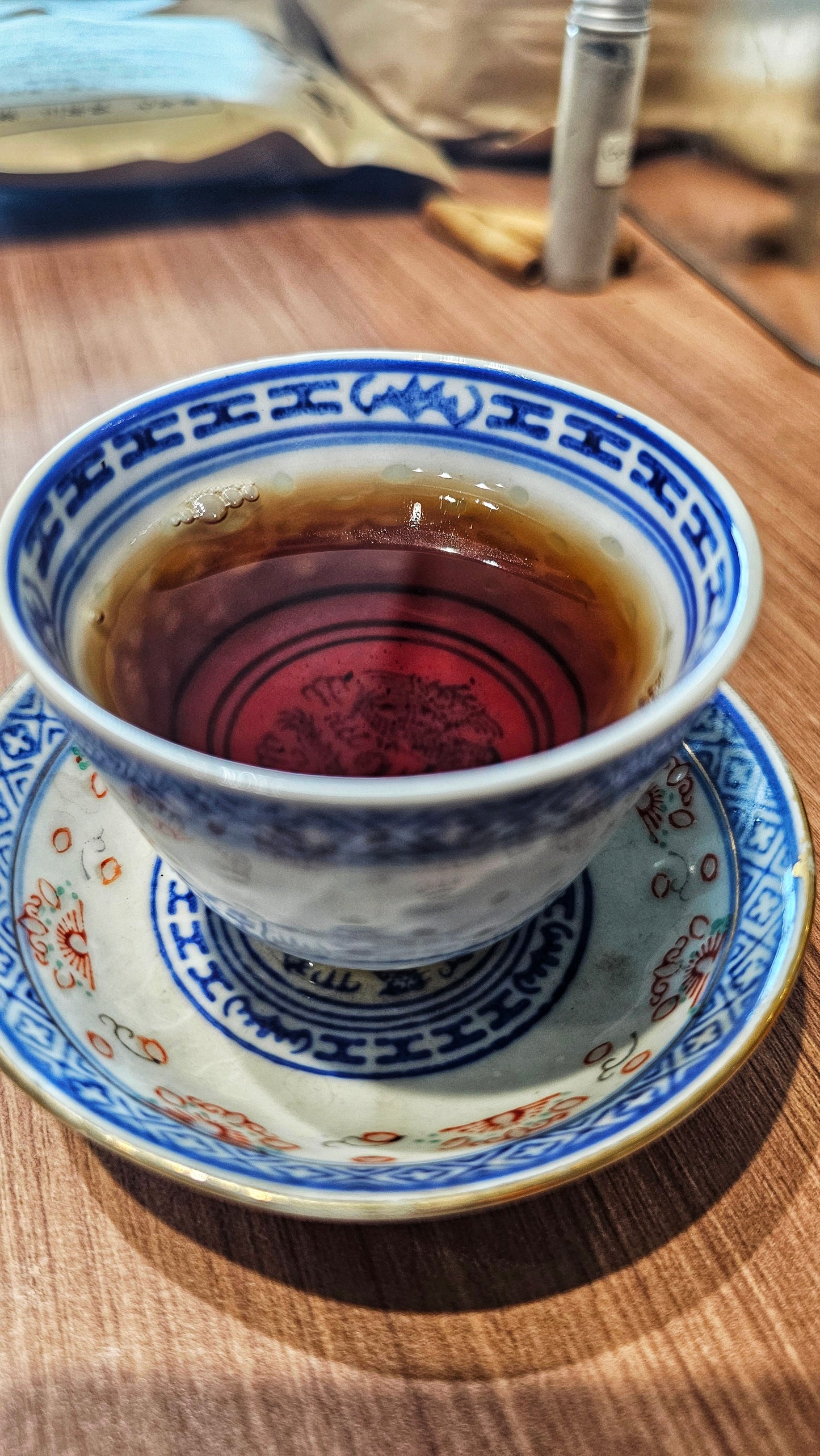 2007 Mengku Sheng Puerh showing aged leaf surface and golden tones