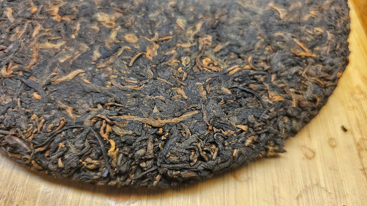 Yiwu wild tree Shu aged in Singapore’s dry cellars. This 2005 Xinghai is nutty, clean, and full of grounding energy—rare and beautiful.