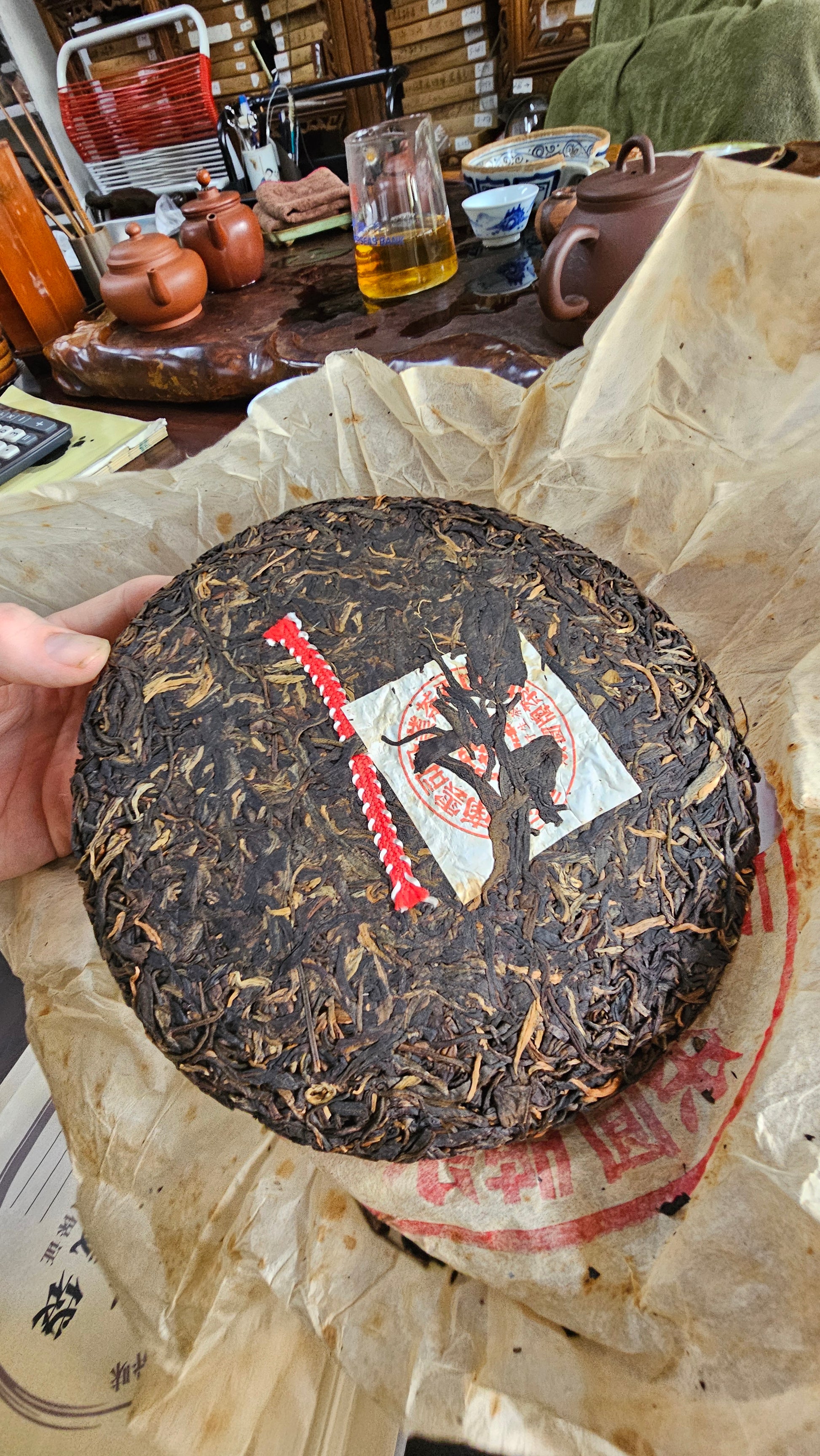 This 1990s Red Ribbon Sheng is smooth and wild, with camphor, honey, and soft aged character. From the private collection of Mr. T.

