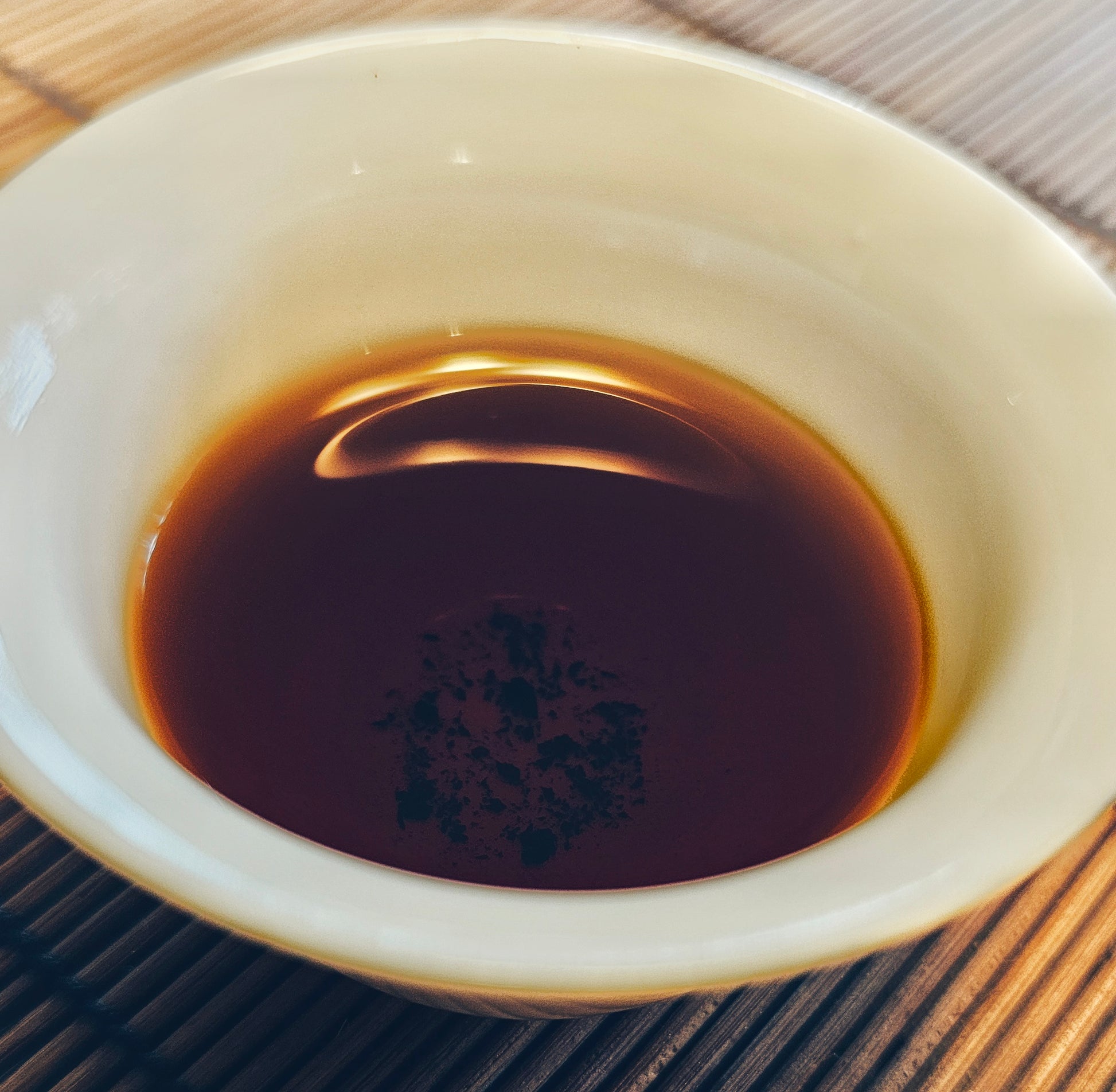 A silent forest in a cup. Forest Sage is a dry-aged 2007 Gong Ting Shu with chestnut, sweet wood oils, and the presence of ancient trees.

