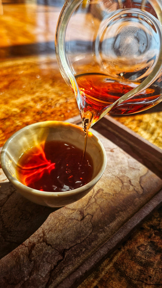 Medicine Cake is a 2008 Lincang Shu Puerh aged in Malaysian clay urns. Smooth, sweet, and vaporous with notes of cookie, mint, and deep medicine.

