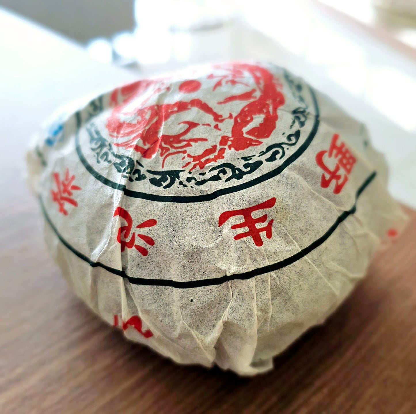 A stunning 2013 gushu sheng from Dali Tea Factory. Sweet Smoke On Water brings clarity, calming qi, and a salivating mouthfeel. A rare Yiwu selection.